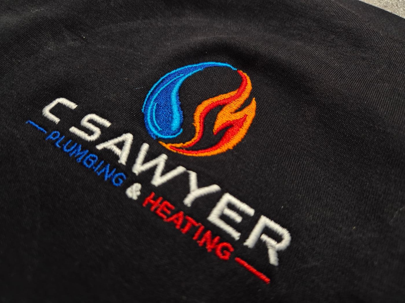 C Sawyer Plumbing and Heating embroidered logo